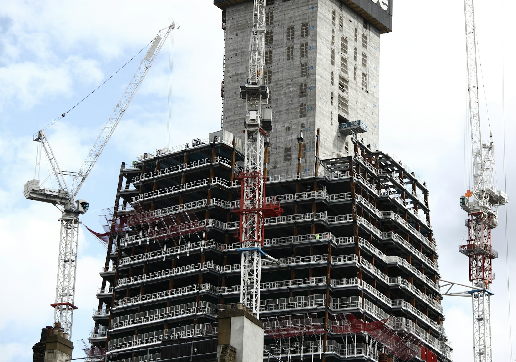 Tower cranes on a high-rise construction site Tower cranes on a high-rise construction site
