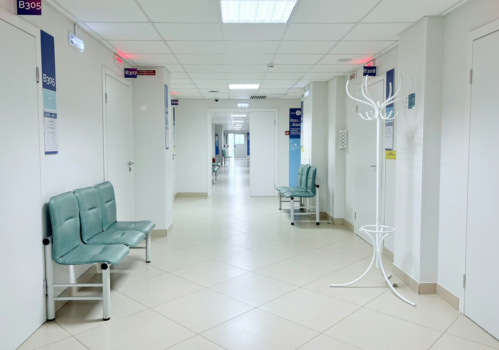 Hospital corridor with waiting seats Hospital corridor with waiting seats