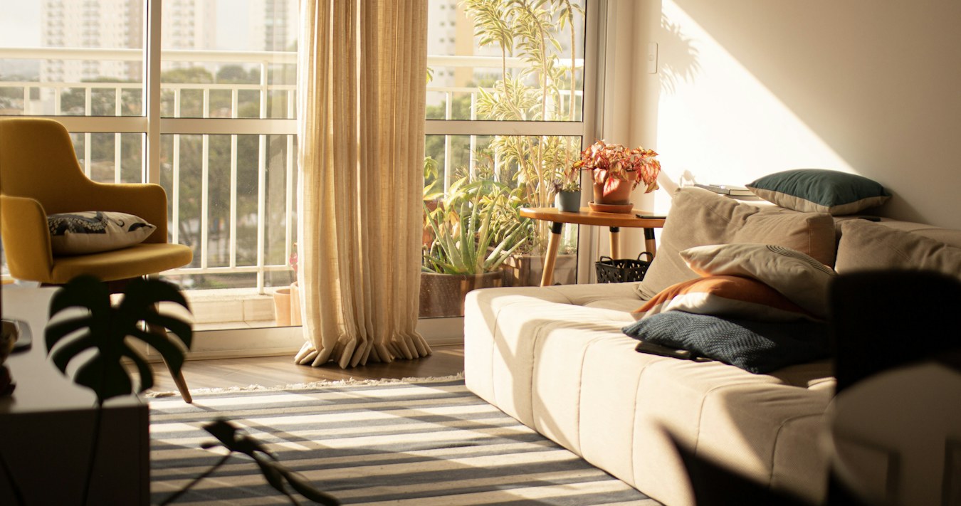 Apartment living room with large windows Apartment living room with large windows