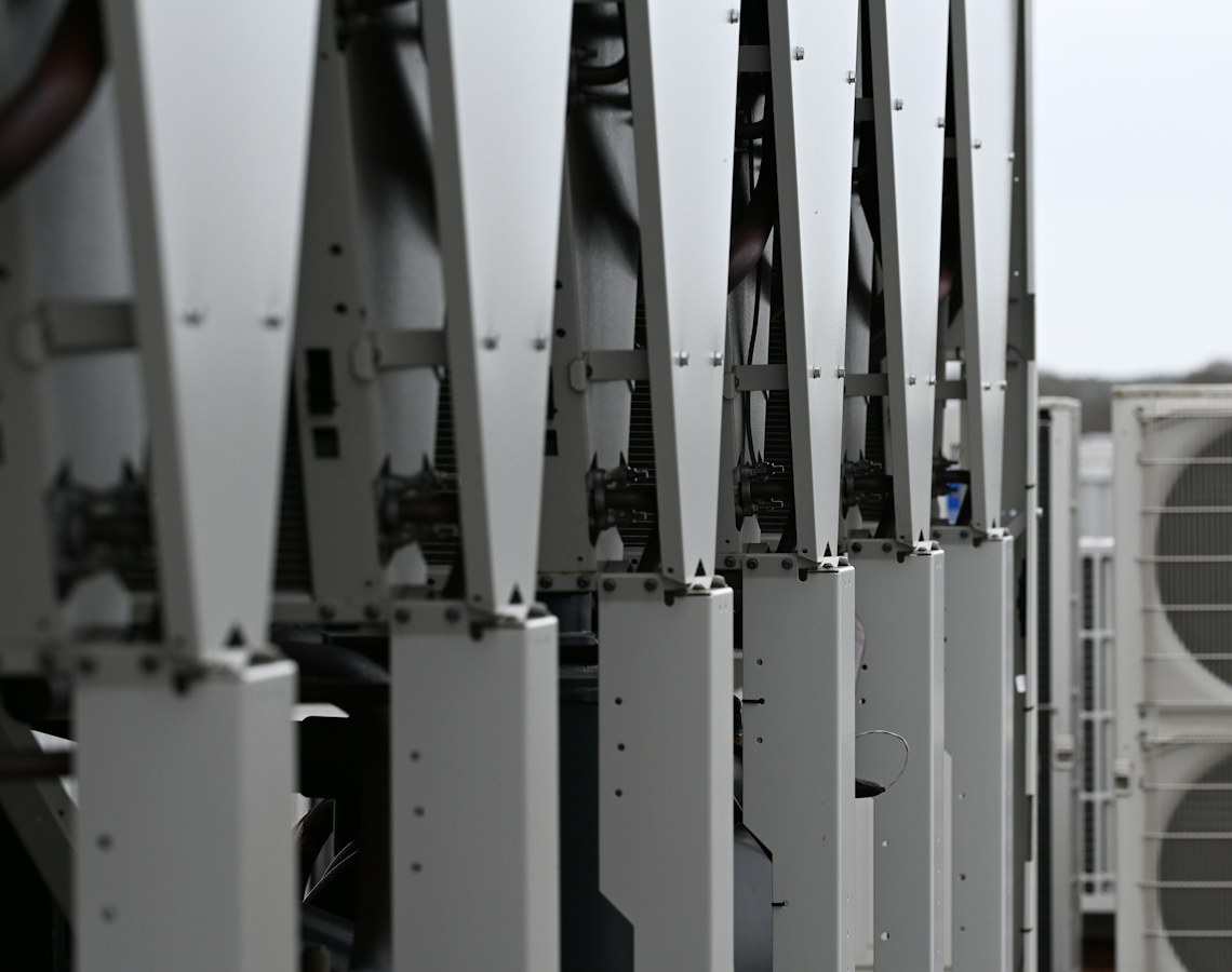 Row of rooftop HVAC units Row of rooftop HVAC units