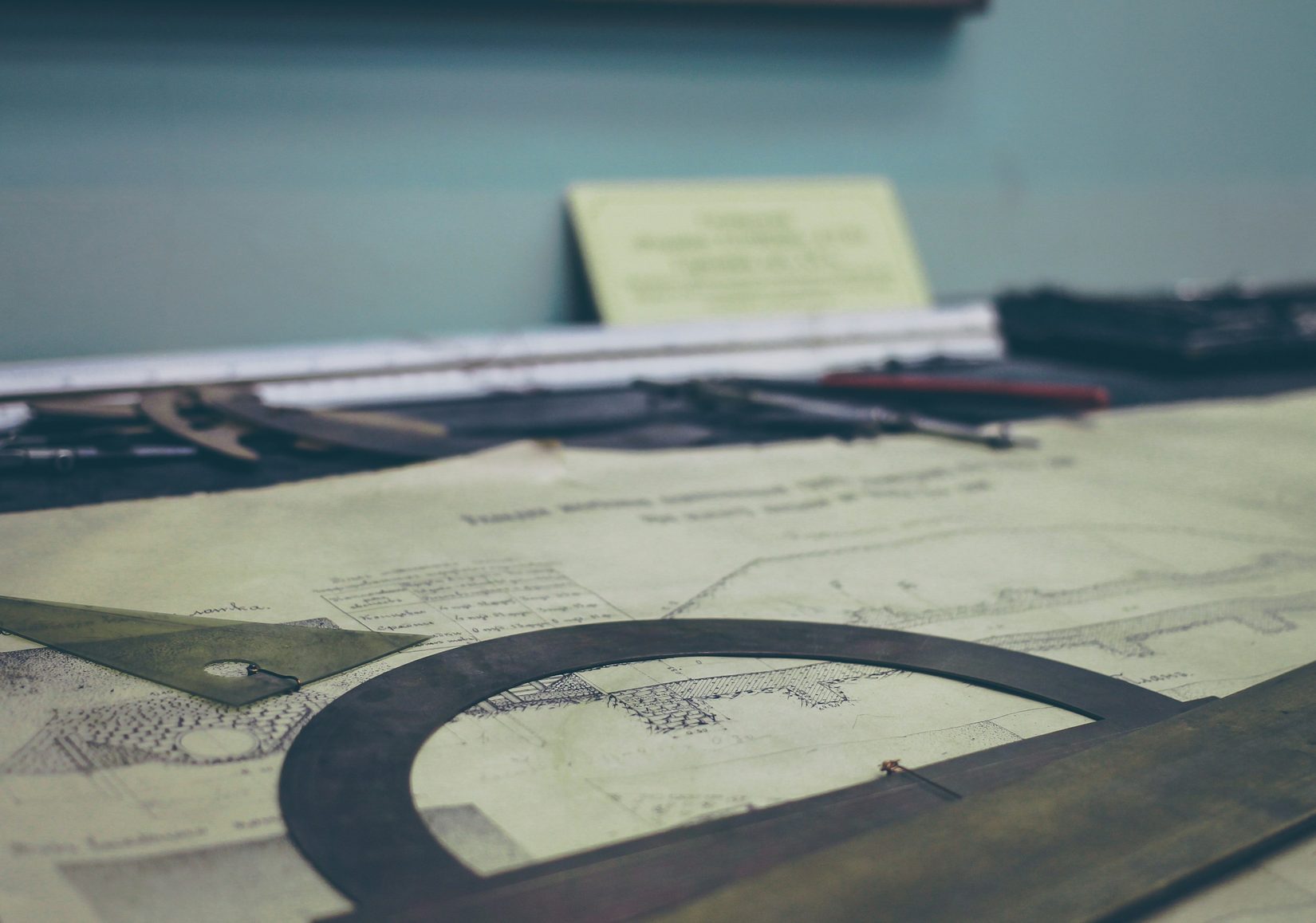 Structural beam design drawing on a desk Structural beam design drawing on a desk