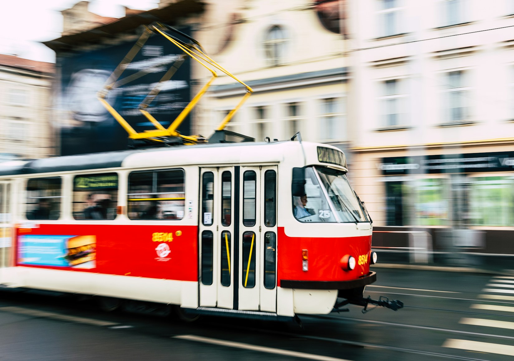 Tram passing along a city street
