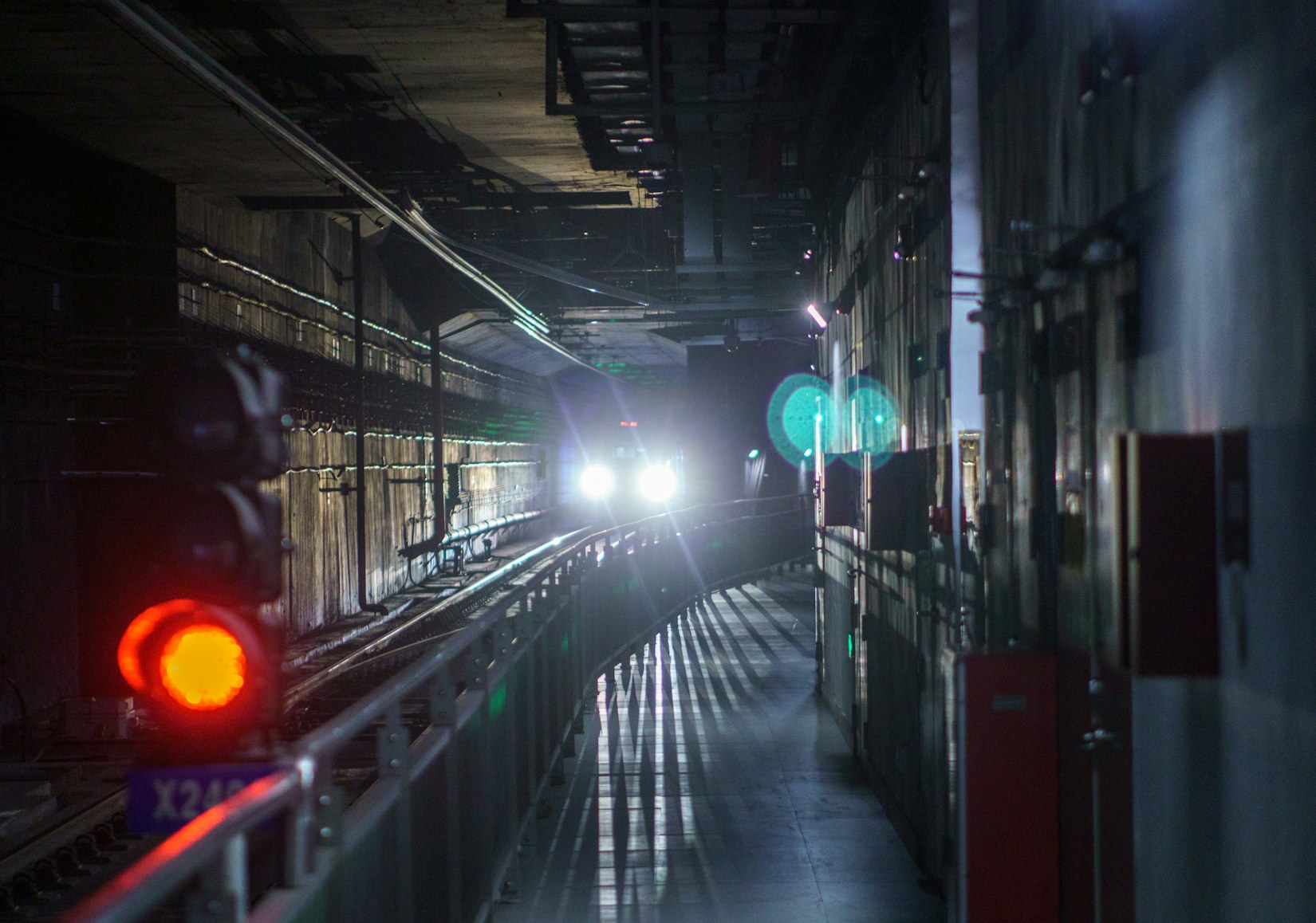 Train approaching through an underground tunnel